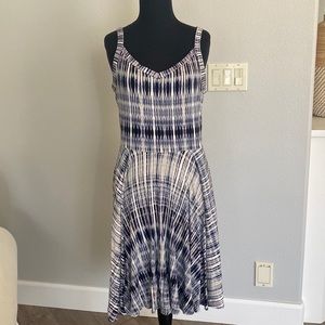Fun print mid length summer dress. Size L